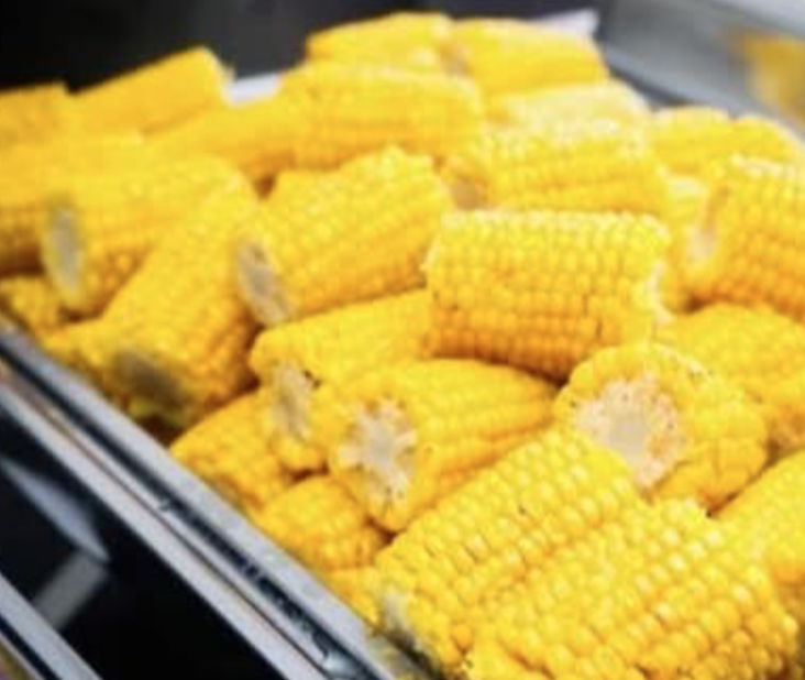 Tray of buttered corn on the cob