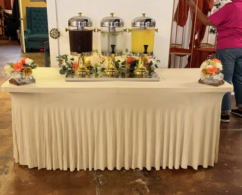 Beverage station with three dispensers and florals